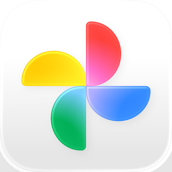 Google Photos app icon with a white soft 3D squircle design featuring an abstract pinwheel.